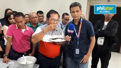 Piñol accepts challenge, eats bukbok rice