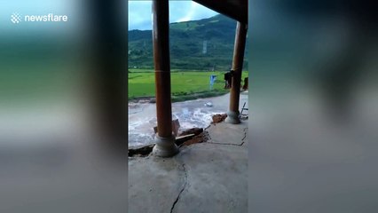 Villager captures home crumbling from the inside amid heavy flooding