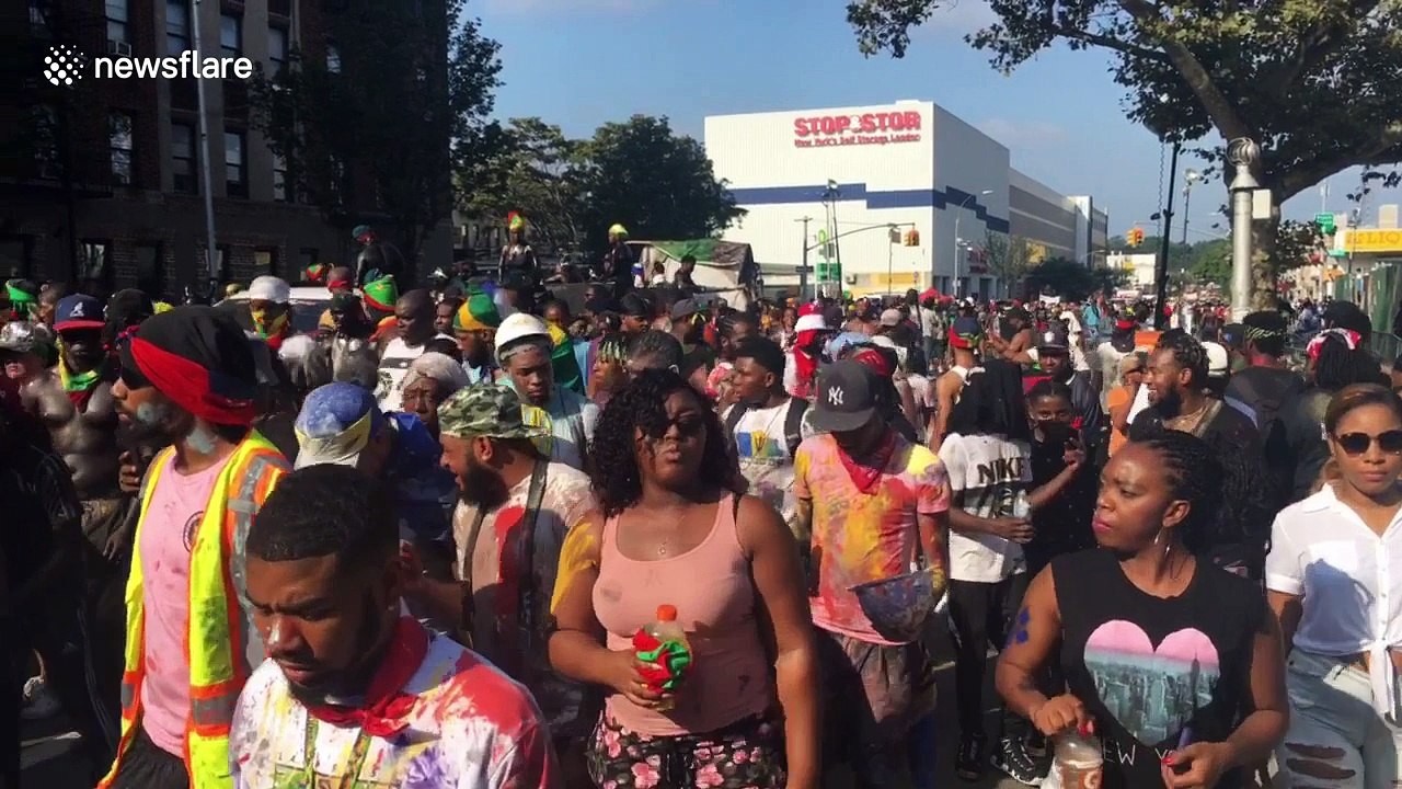 New York revellers grind in street and get covered in paint amid J'ouvert celebrations