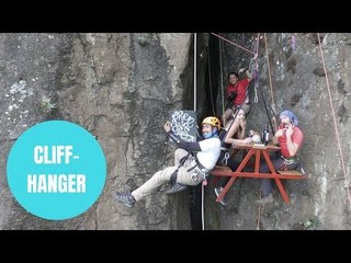 An adrenaline junkie proposed to his girlfriend while sitting on a bench suspended 330ft in the air