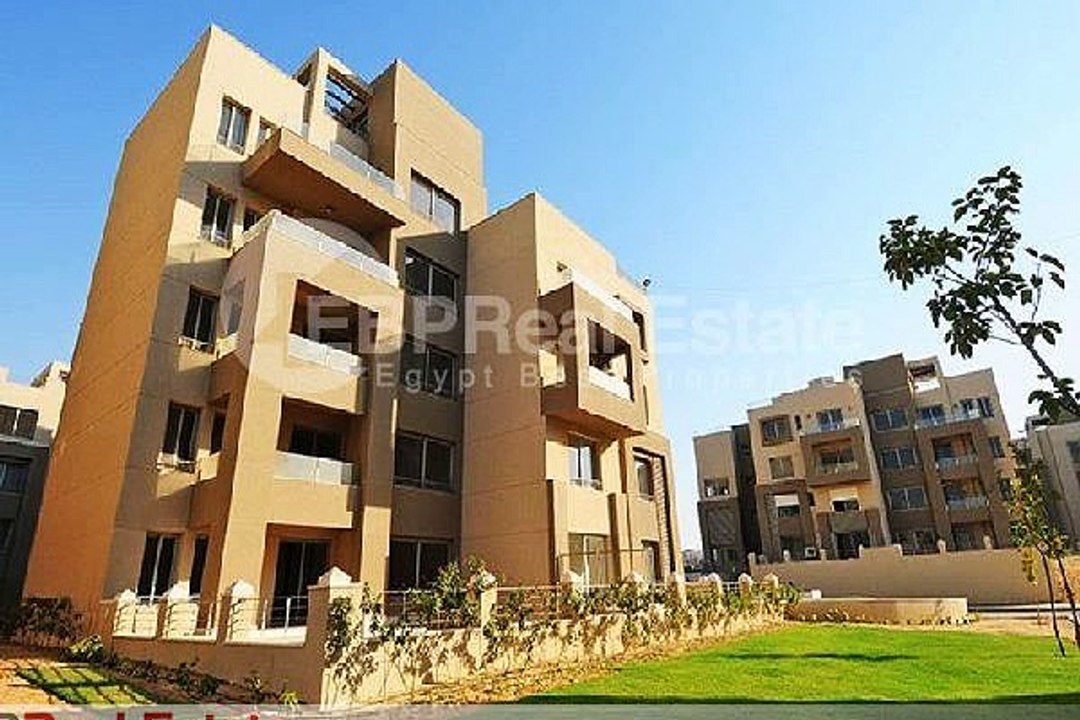 شقة بالدور الارضي بحديقة للبيع بالقسط في بالم هيلز القاهرة الجديدة