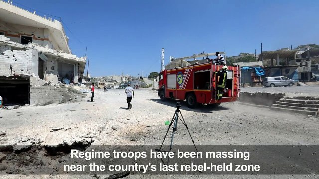 Syrians put out fires after Russian airstrikes near Idlib