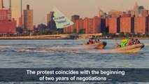 Greenpeace activists fly banners ahead of UN talks on high seas