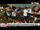 Lomba Lari Sambil Menggendong Istri