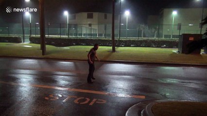 Crazy man stands in the middle of street, braves Storm Gordon