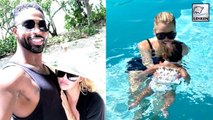 Khloe Kardashian & Tristan Thompson Head On A Family Vacation With Baby True