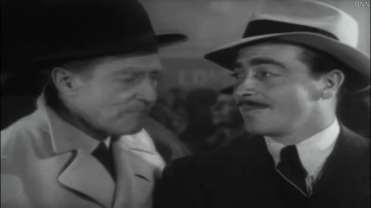 Bulldog Drummond's Bride {1939}  .  {Action, Adventure, Comedy}  .  {John Howard}