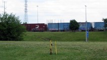 Steel Train Passes by a set of 86 foot high cube boxcars at the Rouge Plant