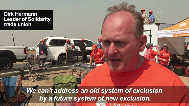 White S.African workers march against black share scheme