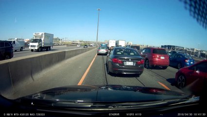 Forgetful Driver Retrieves Phone from Back of Car