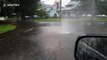 Manhole cover nearly bursts off after downpour in Connecticut