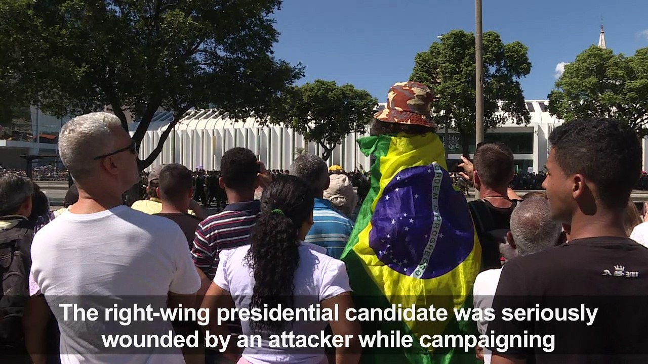 Brazilians watching military parade react to attack on Bolsonaro