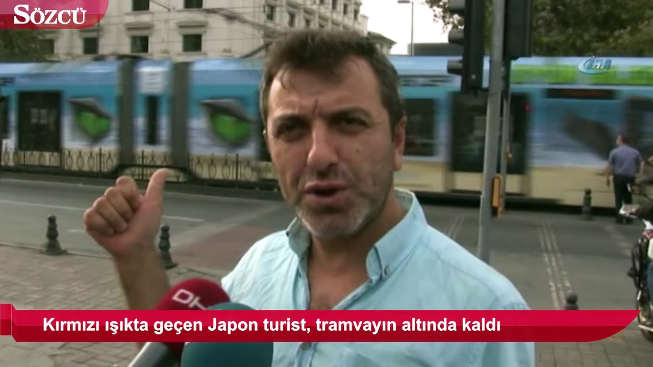 Kırmızı ışıkta geçen Japon turist, tramvayın altında kaldı