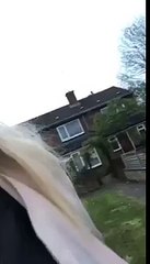 girl struggles to walk in heels and falls