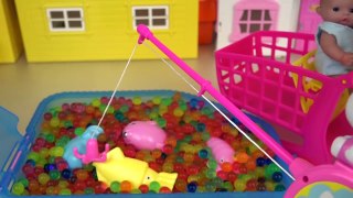 Baby doll fishing game surprise eggs toys and cooking food play