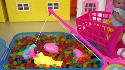 Baby doll fishing game surprise eggs toys and cooking food play