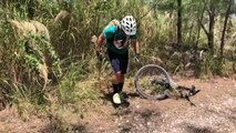 Biker Flies off Bike After Jumping up Elevated Dirt Road