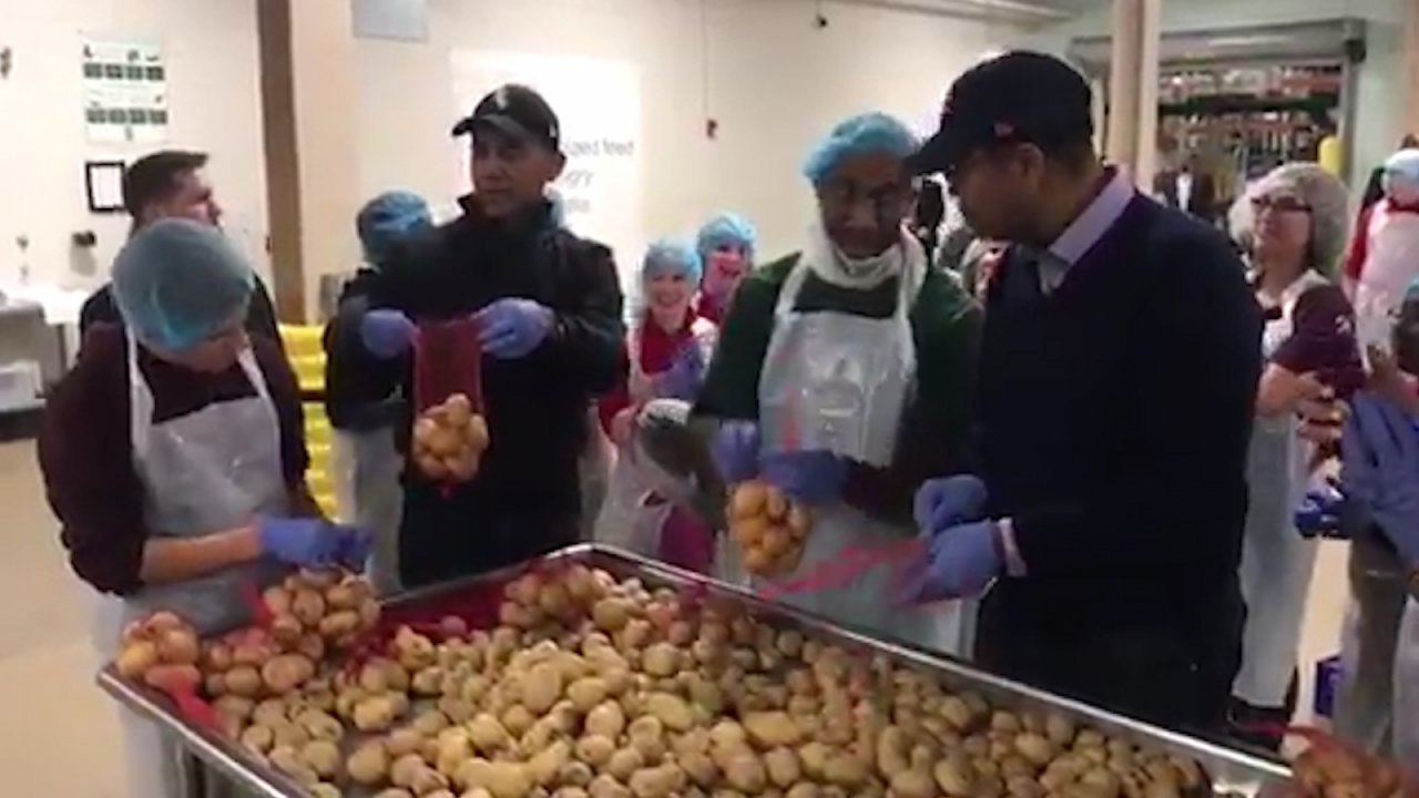 Barack Obama Volunteers At Chicago Food Bank For Thanksgiving