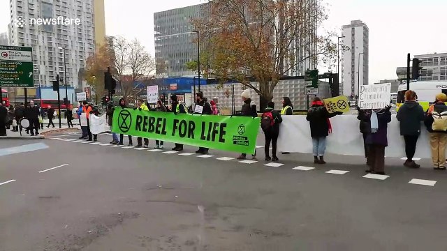 Angry commuter confronts climate activists blocking Elephant & Castle during rush hour