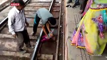 Hindistan'da tren raylarına düşen bebek şans eseri kurtuldu