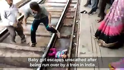 Indian baby survives being run over by train