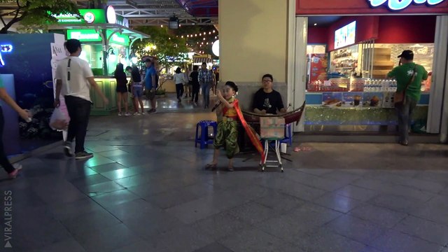 Thai Toddler Singing In Traditional Costume For Loy Krathong Festival