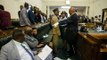 Zimbabwe opposition MPs removed from parliament after refusing to stand when president entered