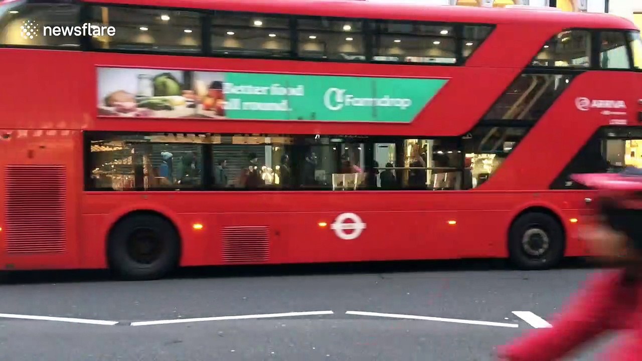 Shoppers queuing on Oxford Street for shoe sales during Black Friday