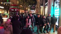 Crowds of late-night Black Friday shoppers swarm Oxford Street