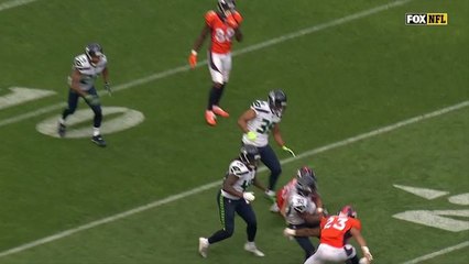 Bradley McDougald intercepts Keenum with a diving grab