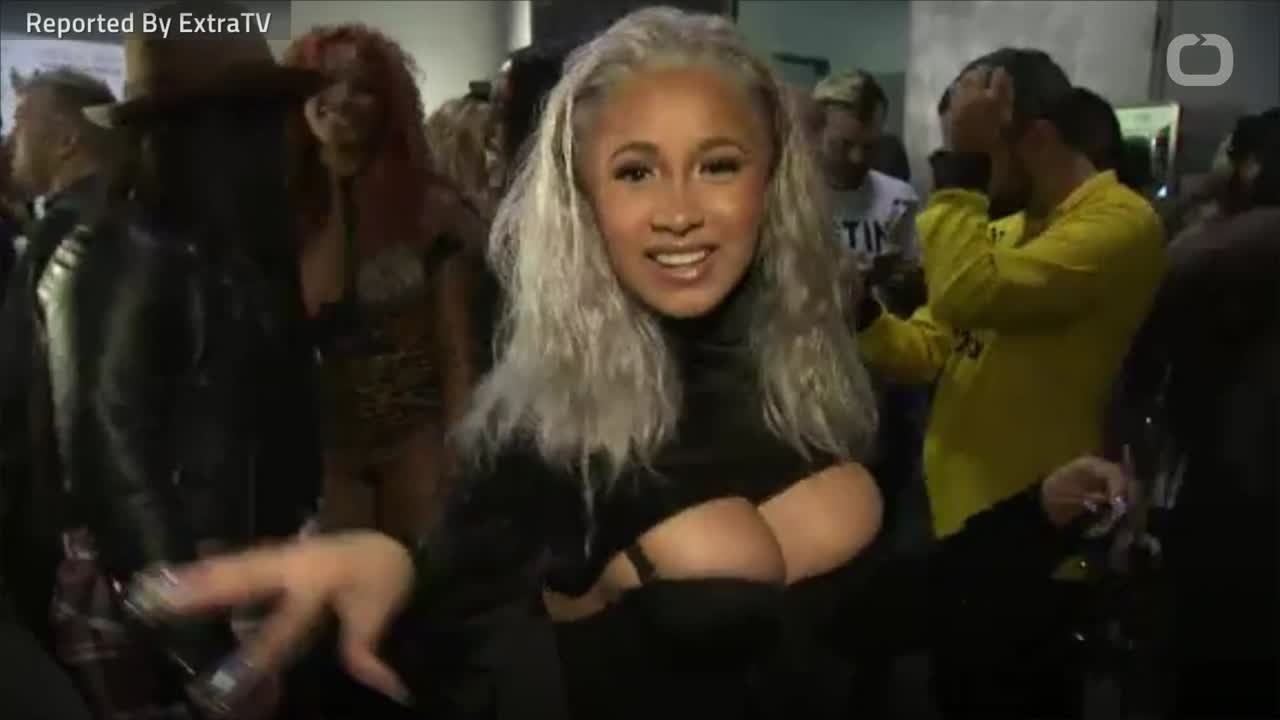 Cardi B Praises Husband At Jeremy Scott Fashion...