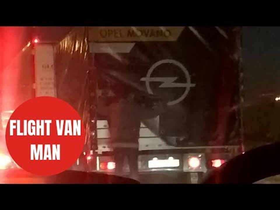 Illegal immigrants brazenly stow away in back of van while queuing outside Calais