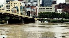Rain Swells Pittsburgh Rivers, Submerges Riverside Walkway