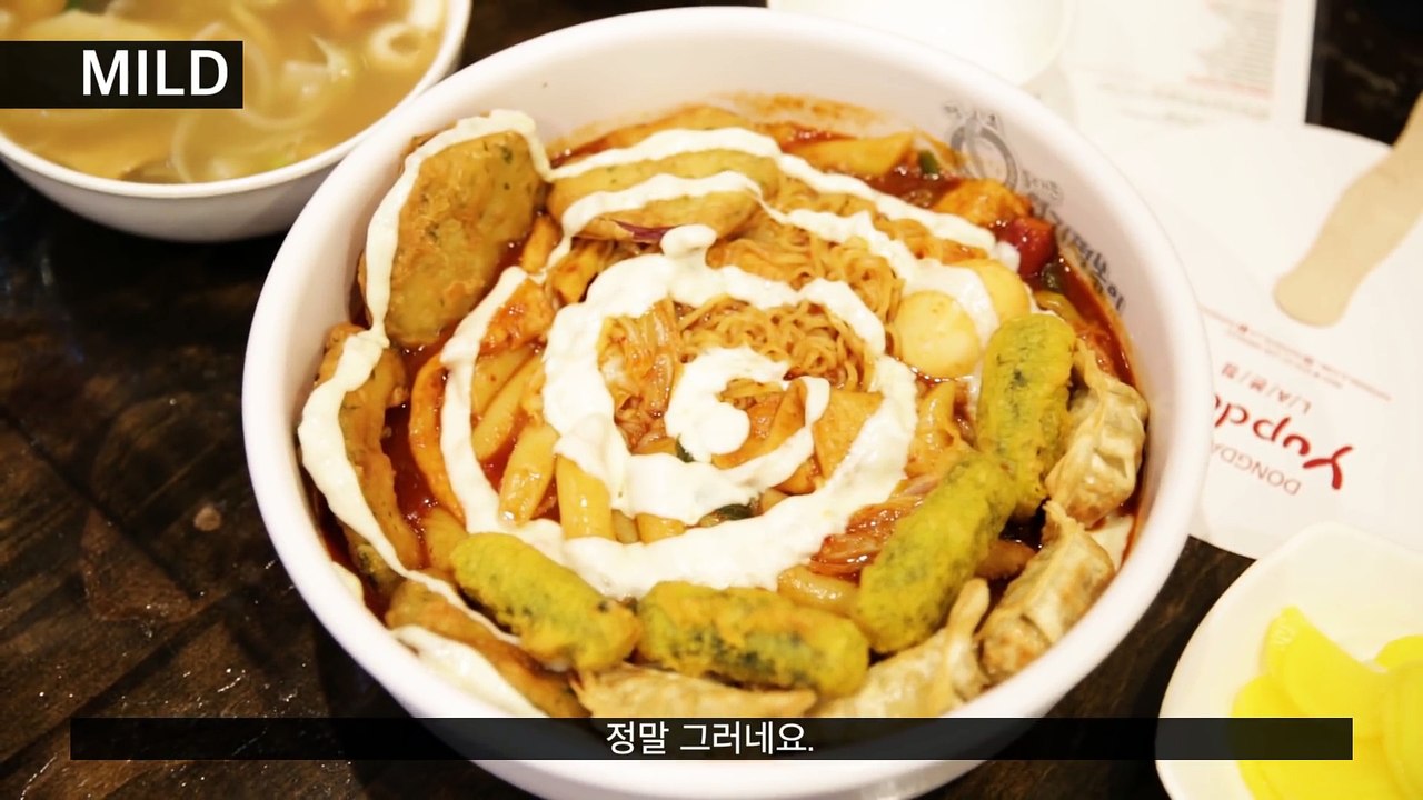 Koreans Try The  Spiciest  Rice Cake