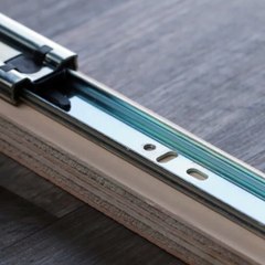 This hidden rail slides out for easy access to kitchen utensils and pans.