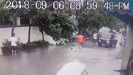 Girl, 9, electrocuted on flooded road before hero passer-by saves her