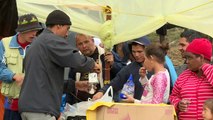 Venezuelan migrants live in an improvised camp in Bogota