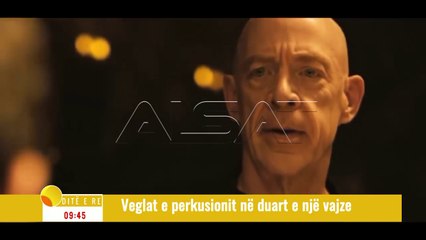 Ditë e re - Veglat e perkusionit ne duart e nje vajze