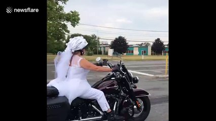 Bride rides Harley in her wedding dress on way to her ceremony