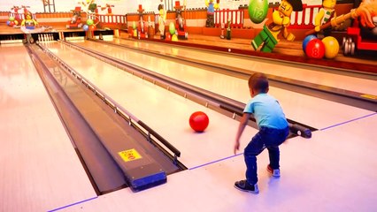 Vlad and Nikita Children and Parents playing Bowling