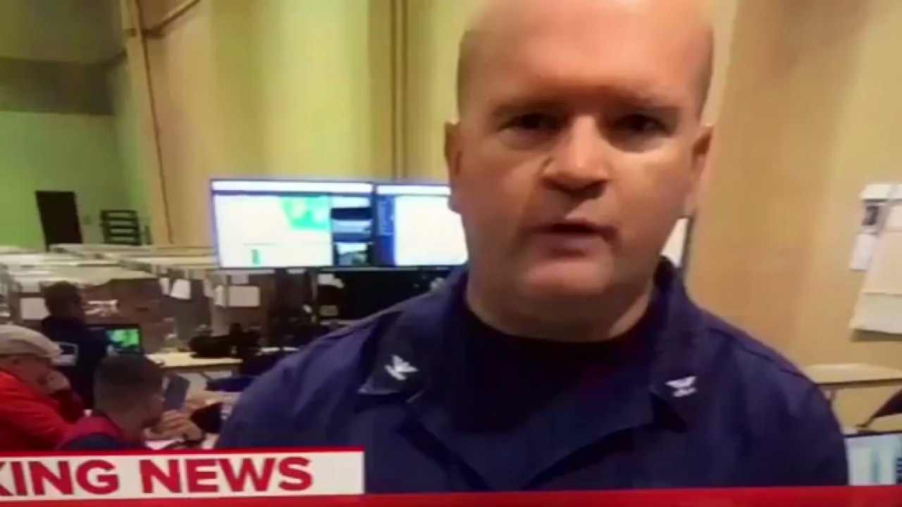 Coast Guard Official Appears To Flash White Power Sign on Television