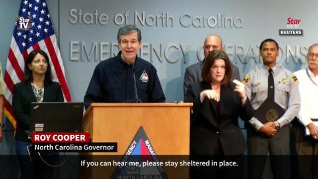 Florence downgraded as death toll climbs