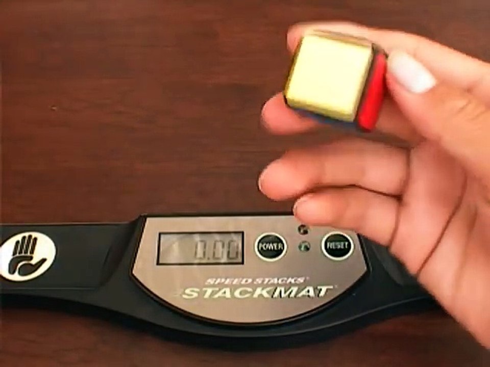 Rubiks Cube 1x1 en 0'07 seconde avec une seule main