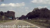 Shocking moment speeding van is filmed flying over roundabout