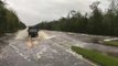 North Carolina National Guard Drives Over Flooded Highways