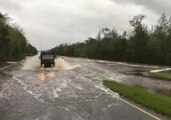 North Carolina National Guard Drives Over Flooded Highways