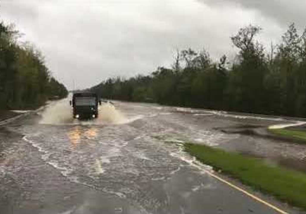 North Carolina National Guard Drives Over Flooded Highways
