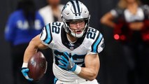 McCaffrey POWERS over defender for 11-yard gain