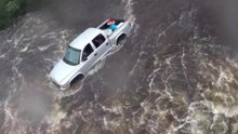 Coast Guard Swimmer Investigates Truck in North Carolina Flooding