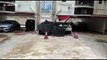 Satellite dish collapses onto car due to strong winds from Typhoon Mangkhut